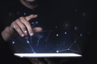 man-using-digital-tablet-psd-mockup-smart-technology_lowres